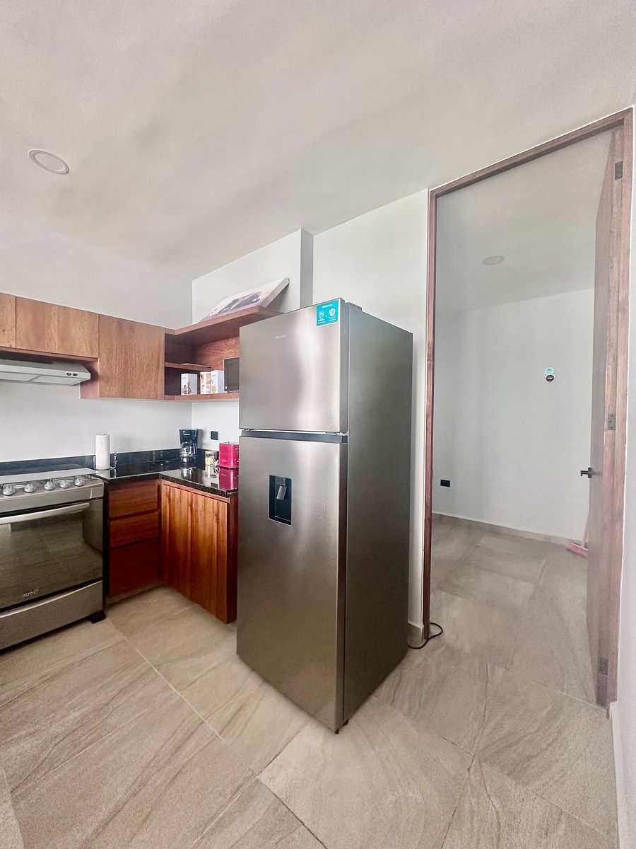 13 of 39: Cocina con acceso cuarto de lavado