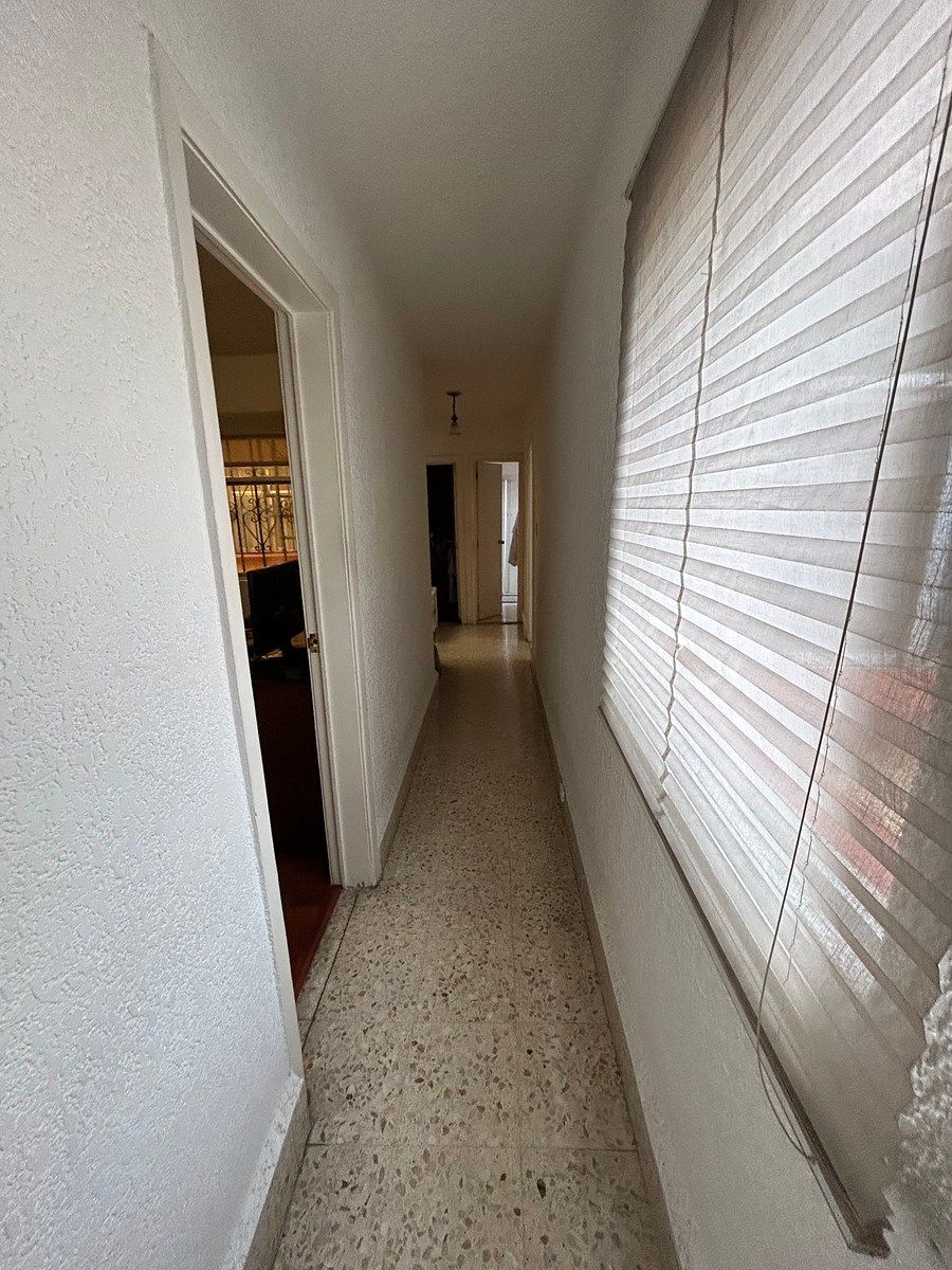 13 de 31: pasillo recamaras