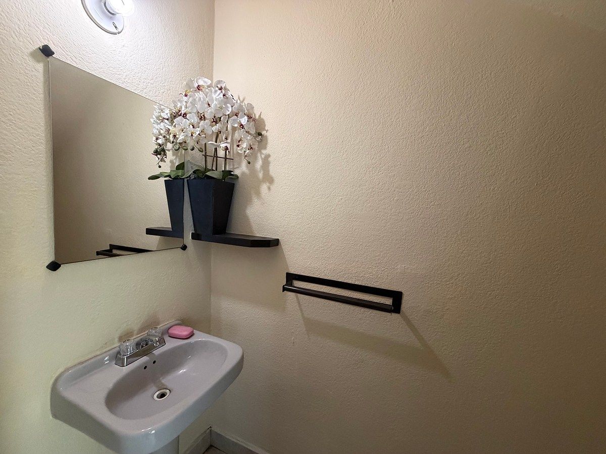 6 de 11: Medio baño