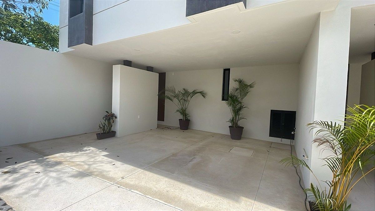 2 de 15: Estacionamiento techado para dos autos