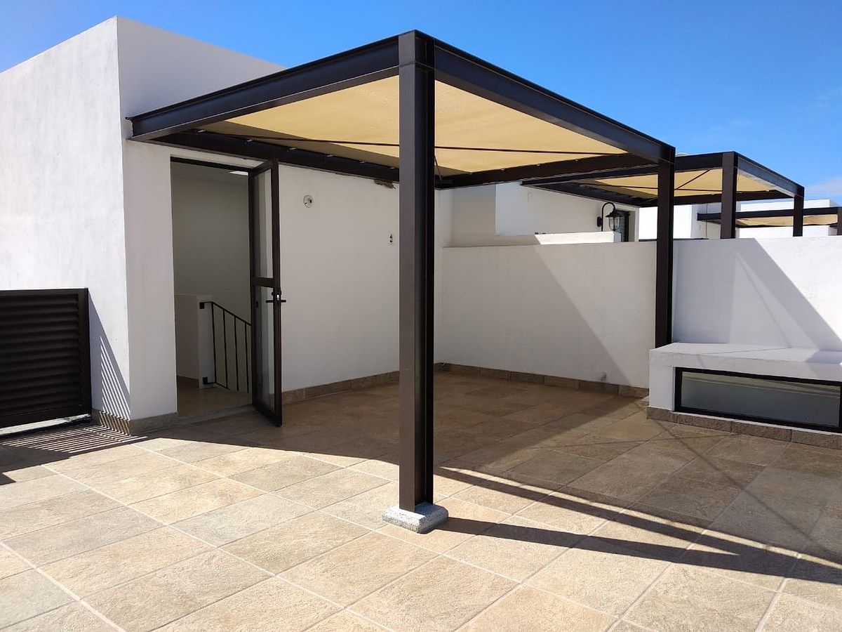 5 of 24: Roof garden - terraza con pérgola