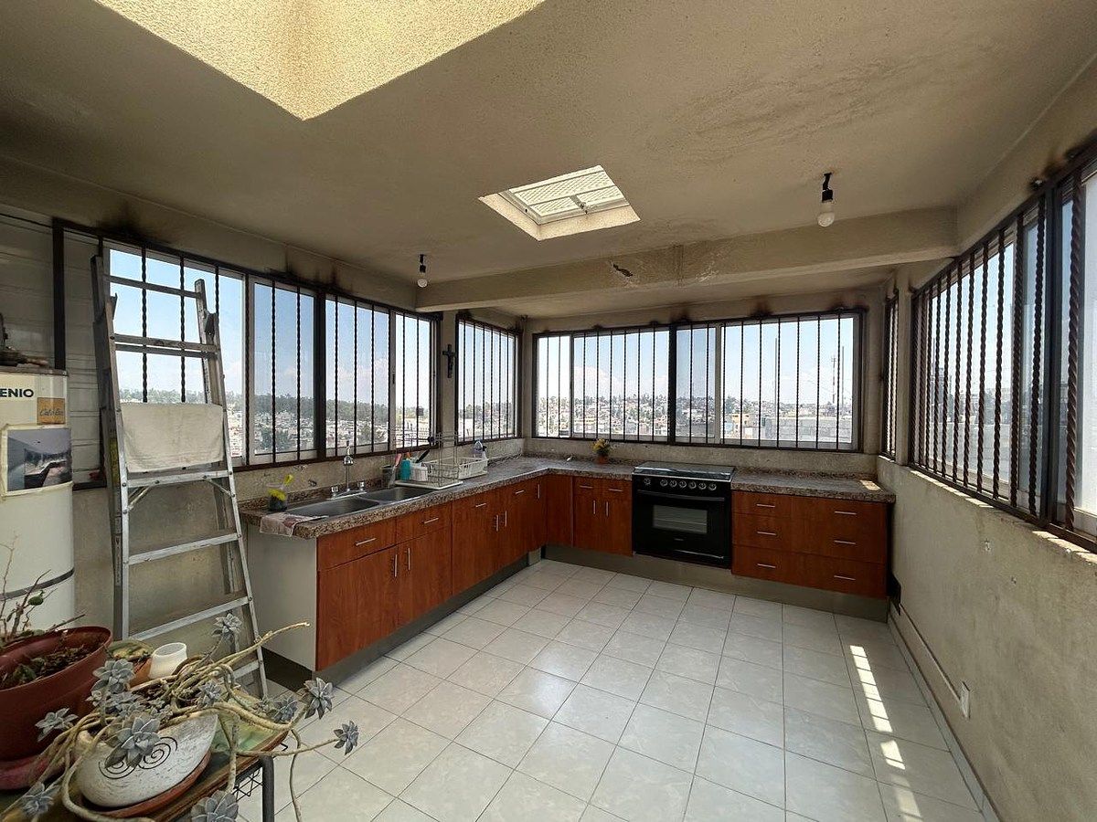 10 de 13: 4to piso sala comedor y cocina