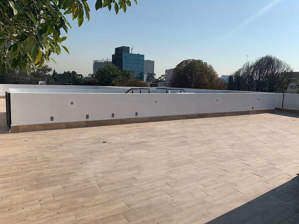 19 de 19: Terraza comunal del edificio