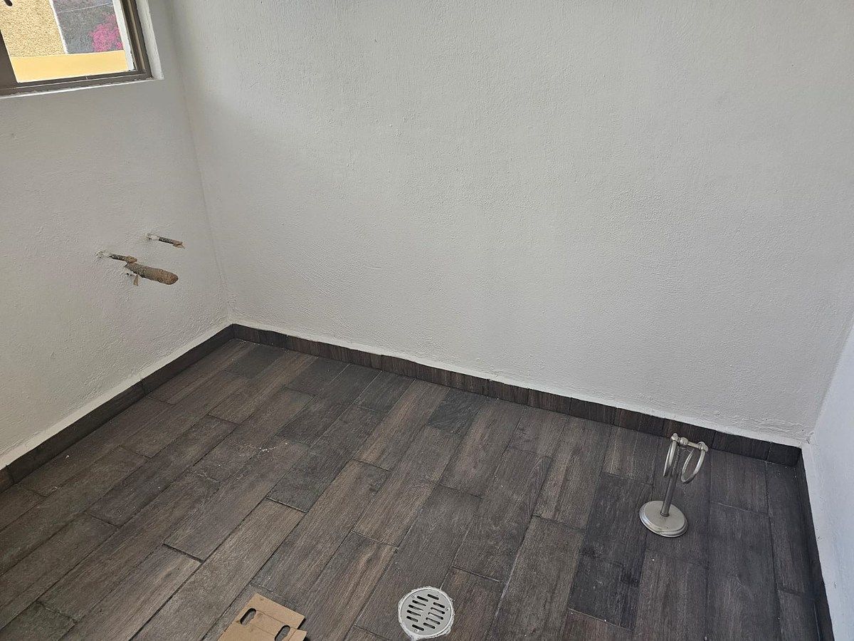 23 de 26: CUARTO DE LAVADO