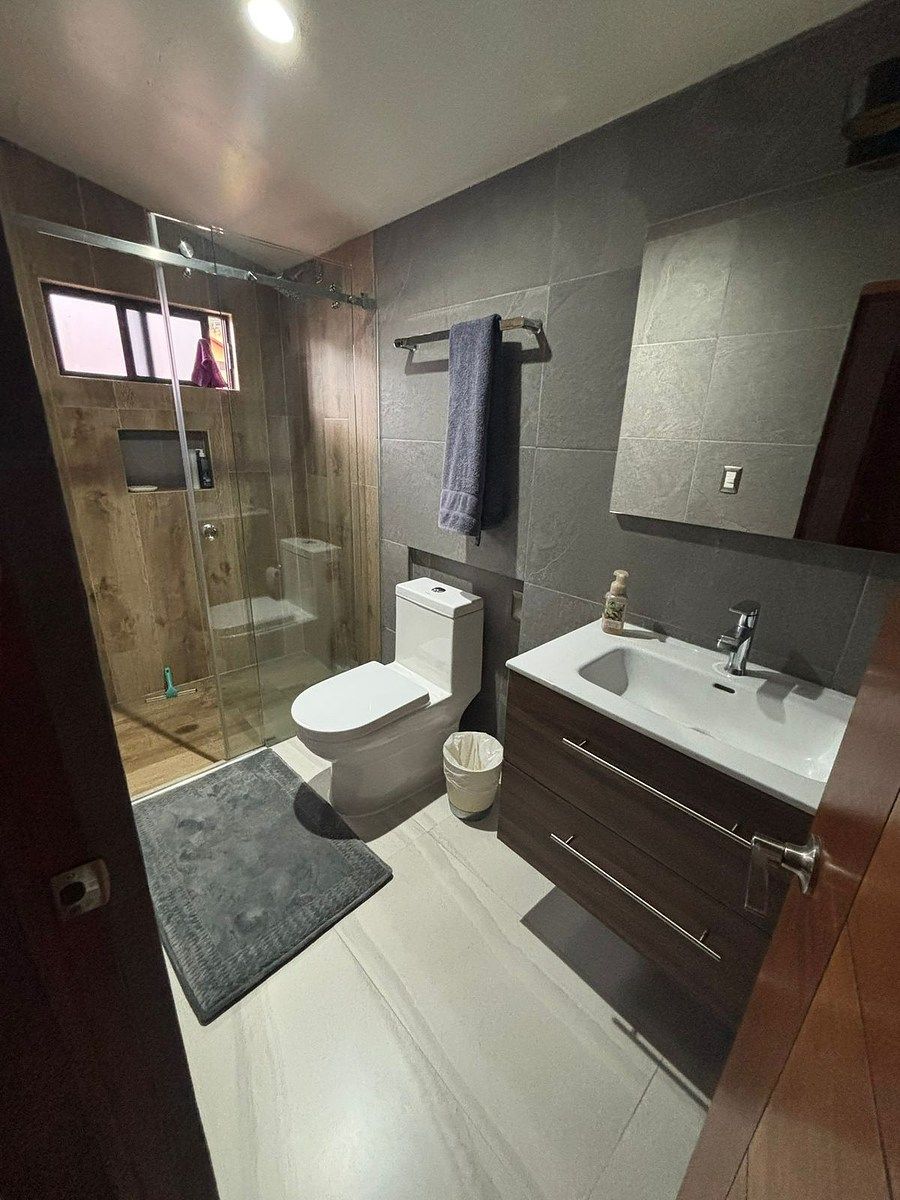 15 de 27: Baño compartido