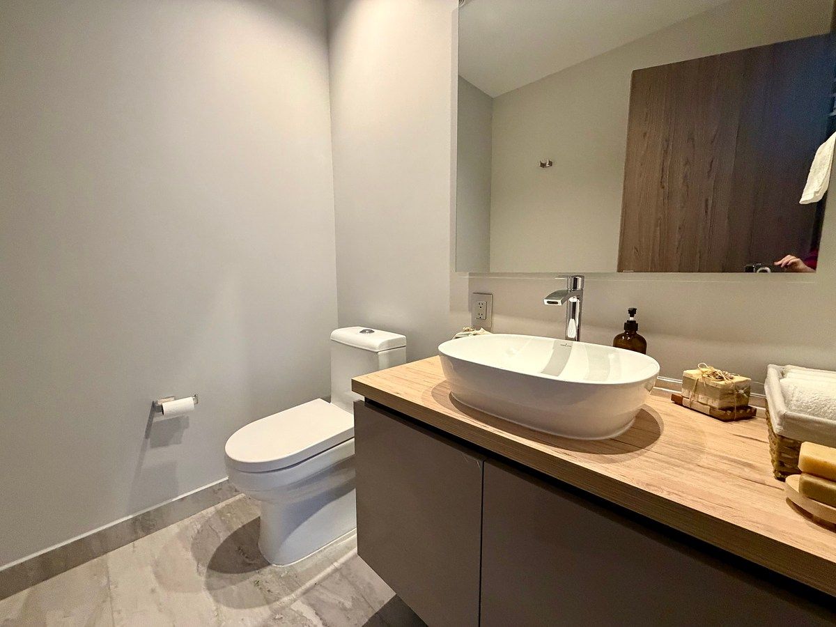 Baño de visitas, foto 17 de 26