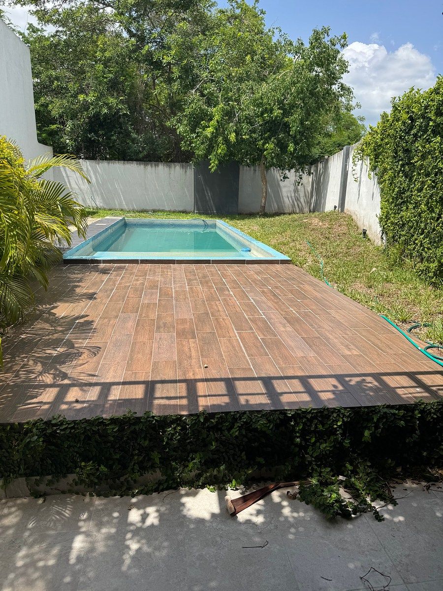 Área común con alberca y terraza con asador, foto 11 de 11