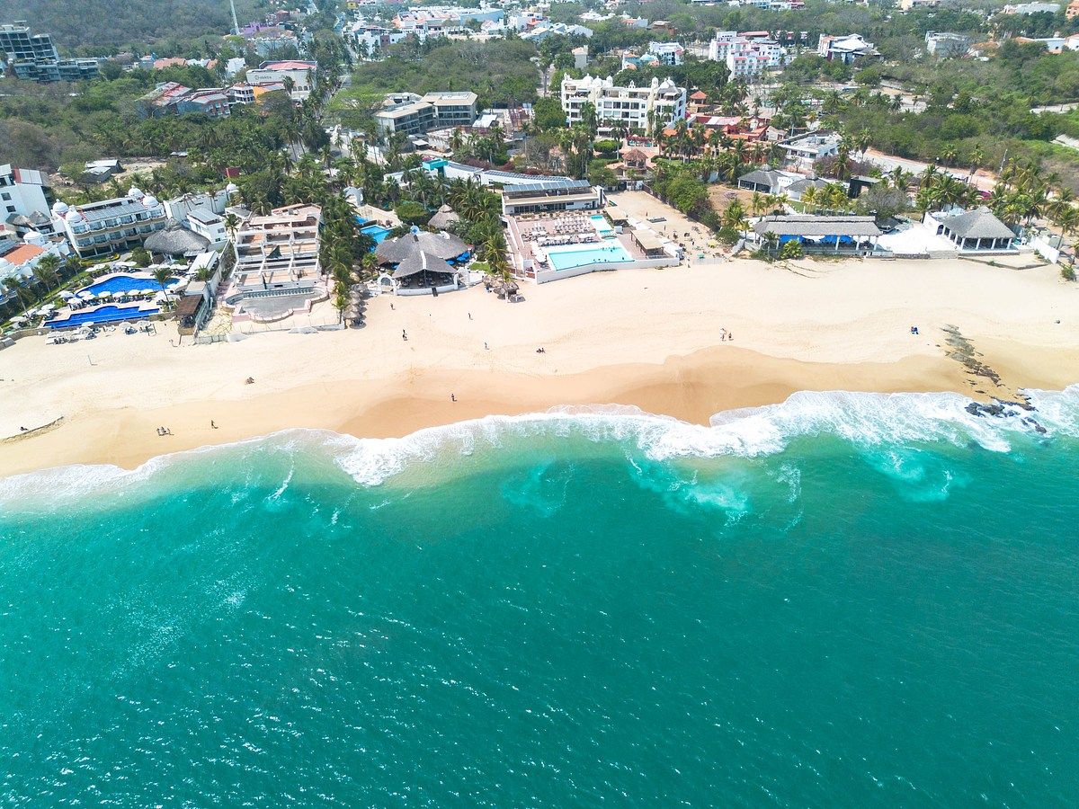Exclusivo Condominio de 2 Recámaras a Pasos de Playa Chahué con Alberca Privada, foto 1 de 50