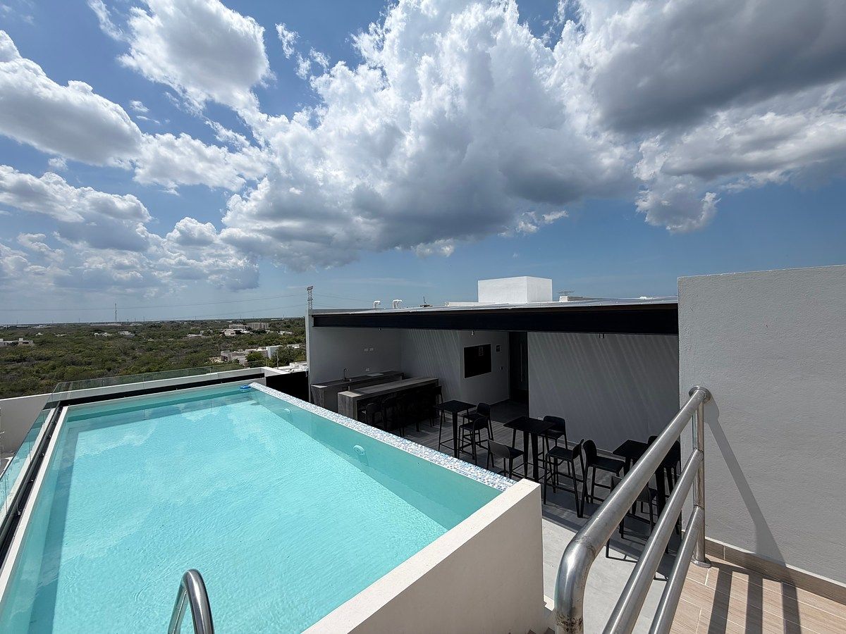 Departamento equipado, en planta baja, en torre con piscina y rooftop., foto 1 de 13