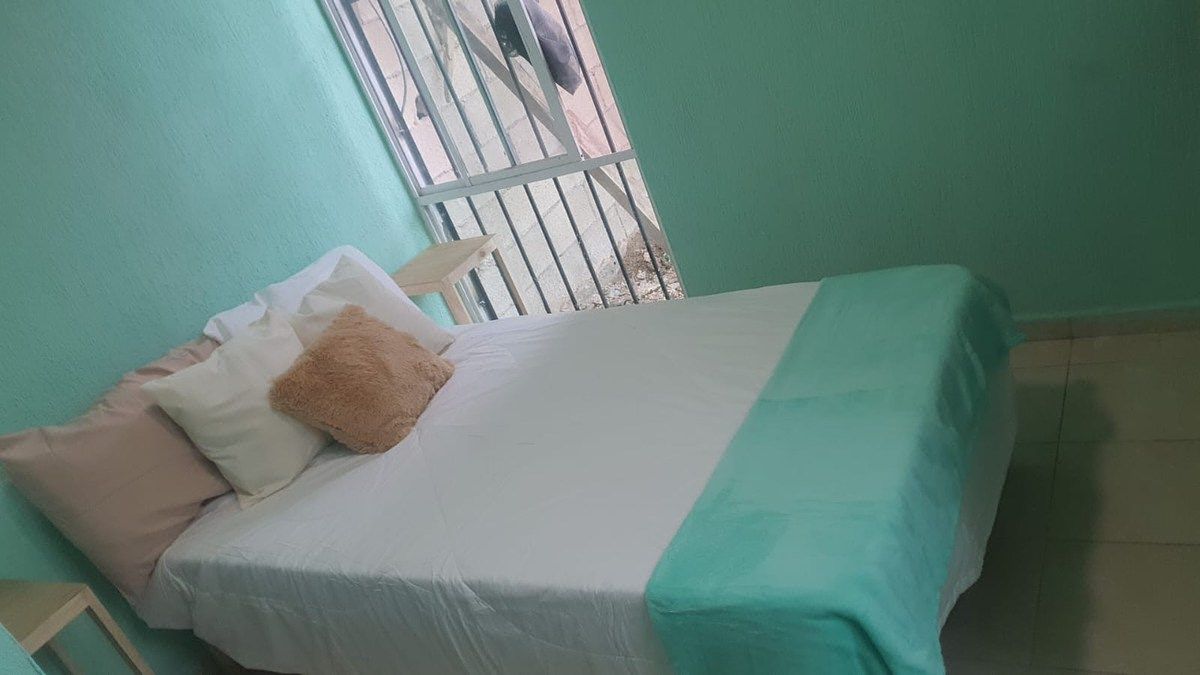 Recámara con cama turquesa - casa venta Caucel, foto 4 de 21