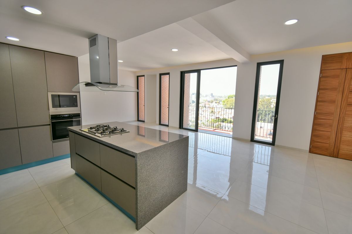 Baja de precio. Departamento en Colomos Providencia - foto 1