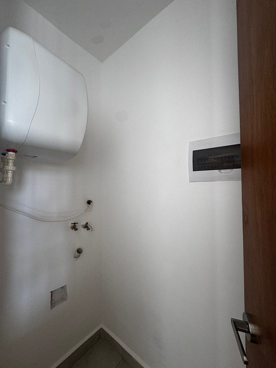 Área de lavandería con calentador eléctrico, foto 7 de 22