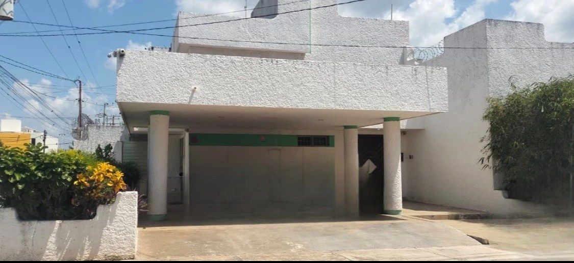 House with pool and solar panels, photo 1 of 13