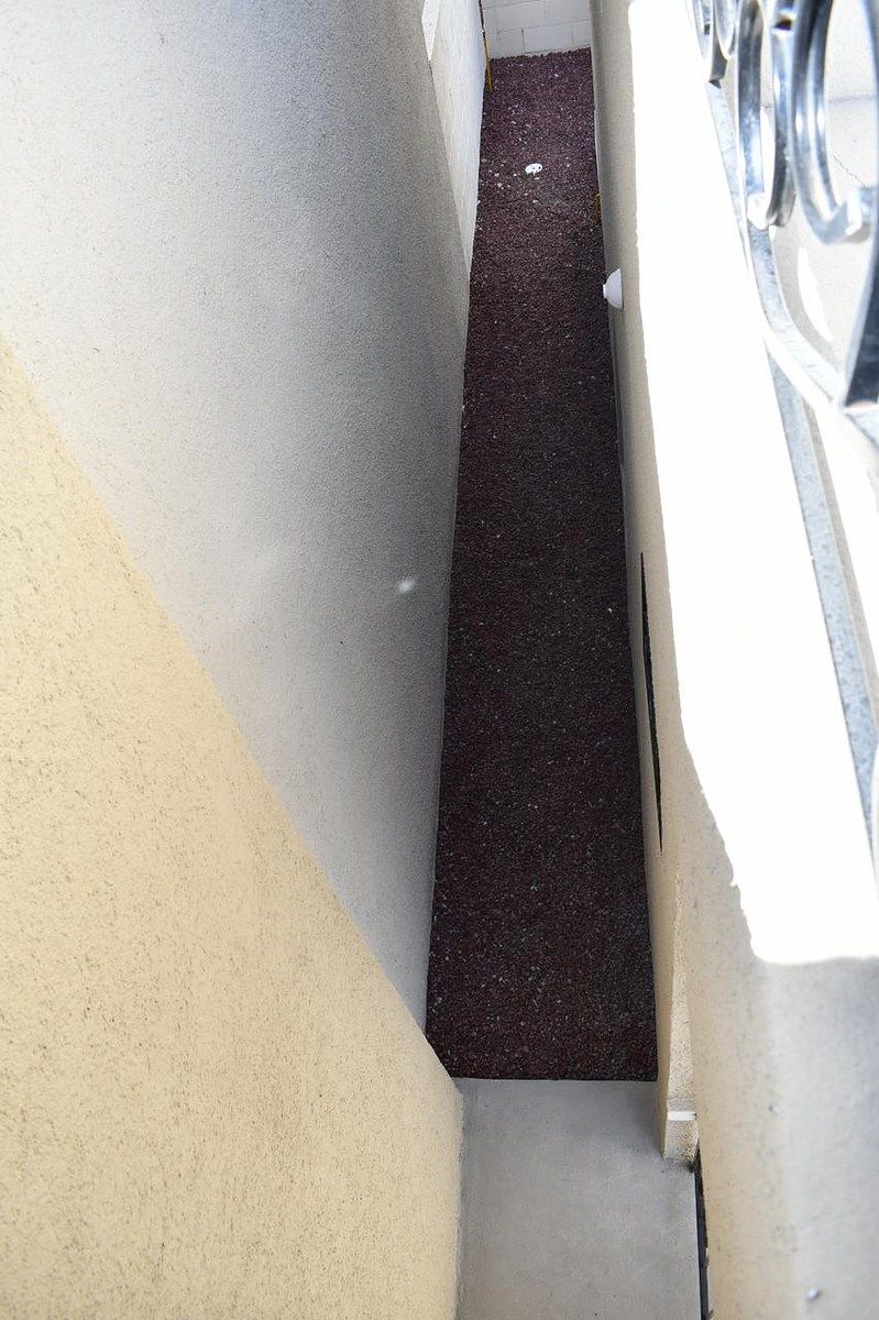 Entrada al patio trasero, photo 2 of 18