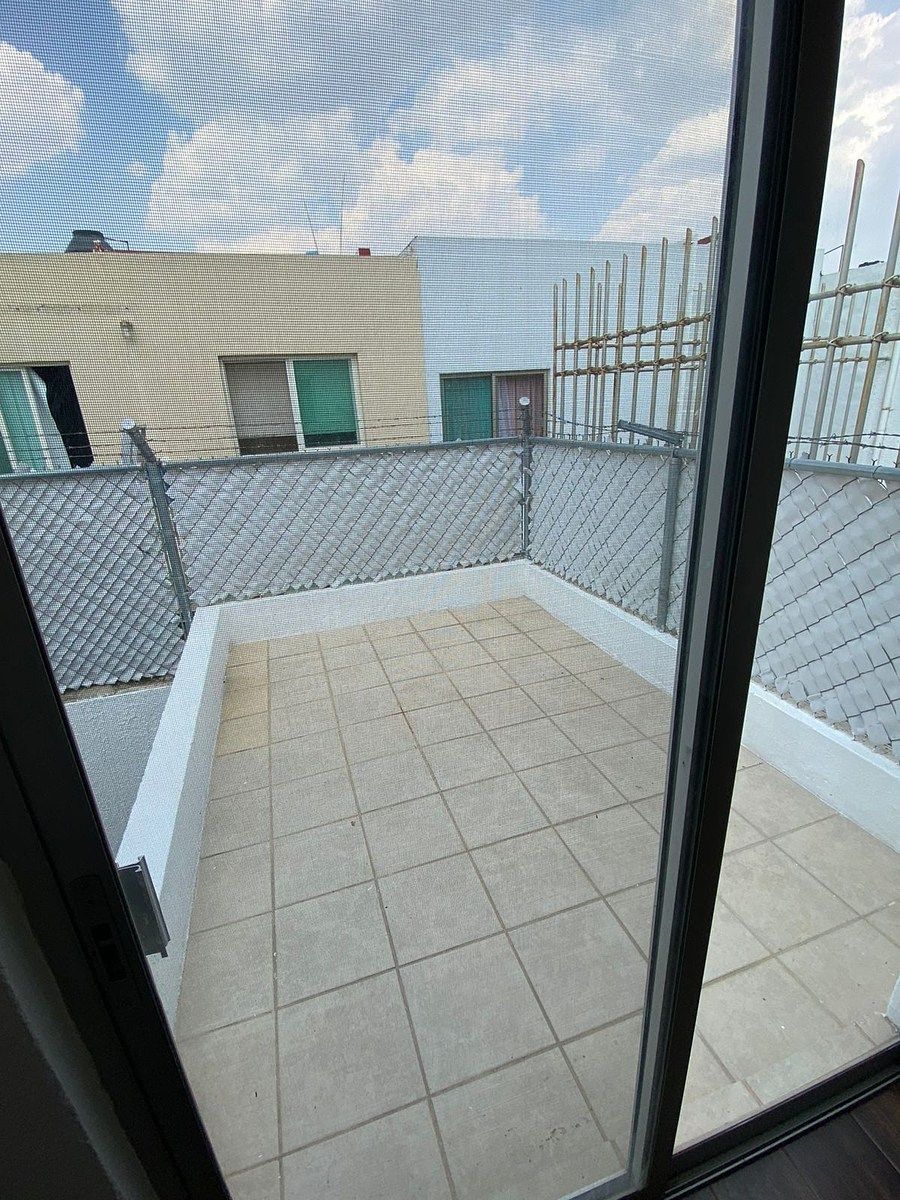 Área planta alta fuera de recámara secundaria, photo 17 of 20
