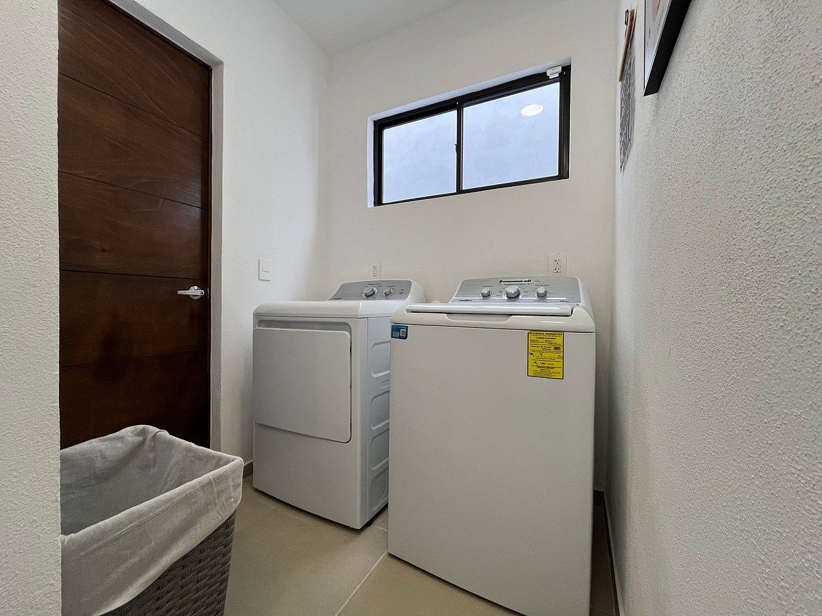 Cuarto de lavado interior con lavadero, foto 18 de 26