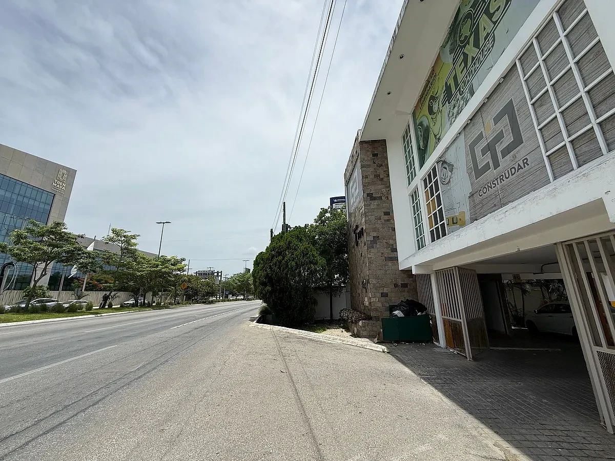 Terreno comercial com construção de locais na avenida principal 60, foto 1 de 13