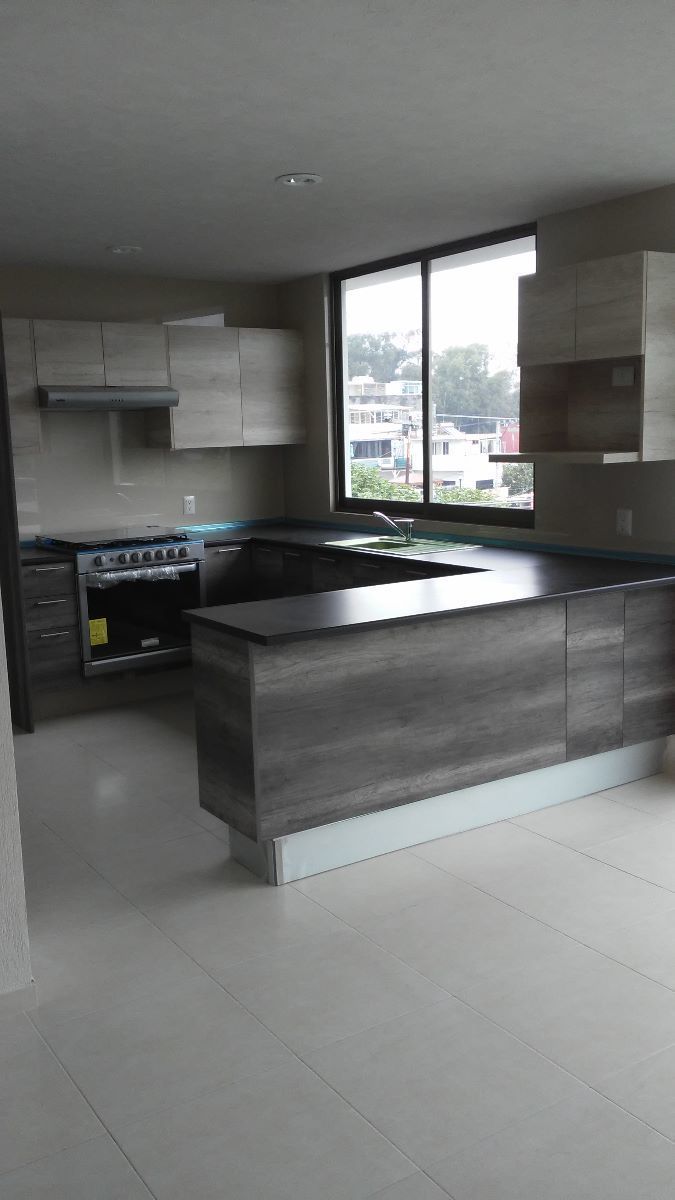 4 de 11: Cocina equipada